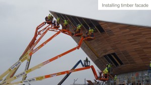 Installing timber facade on the London 2012 Olympic Velodrome