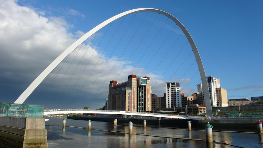 Photo showing Gateshead Millennium Bridge, with the Baltic Gallery in the background